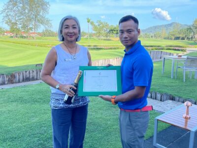 Cpl Omraj Limbu with his 'Hole in One' Certificate and the prize